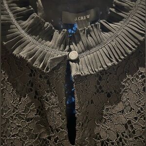 JCrew sleeveless, lace, ruffle neck standup collar.